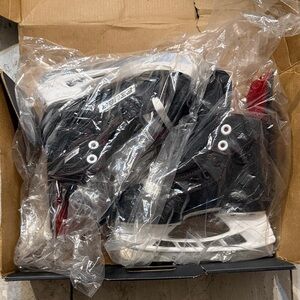 Bauer Black and White Skates with Red Accents